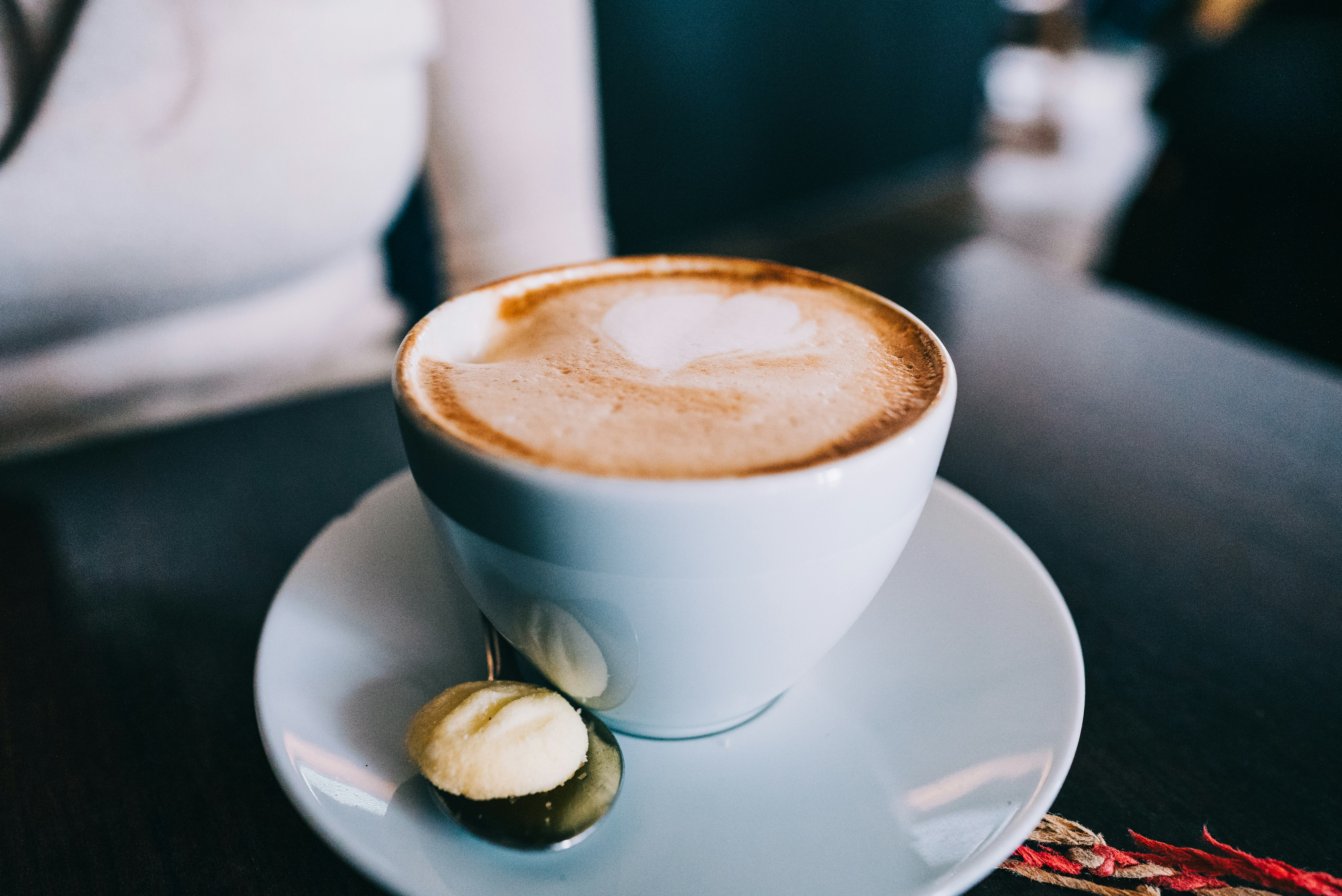 white ceramic cup with saucer